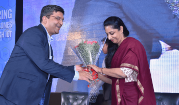 Smt. Aruna Sundararajan Secretary Ministry of Electronics IT welcomed by Dr Rishi Mohan Bhatnagar Chairman IoT India Congress and President Aeris Communications